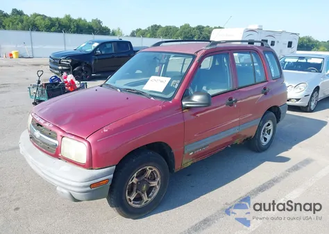 1999 Chevrolet Tracker from USA, damaged, VIN 2CNBJ13C8X6932848